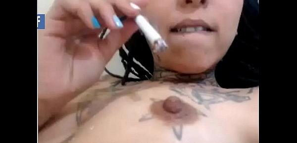 Tatted camgirl burns self with cigarette